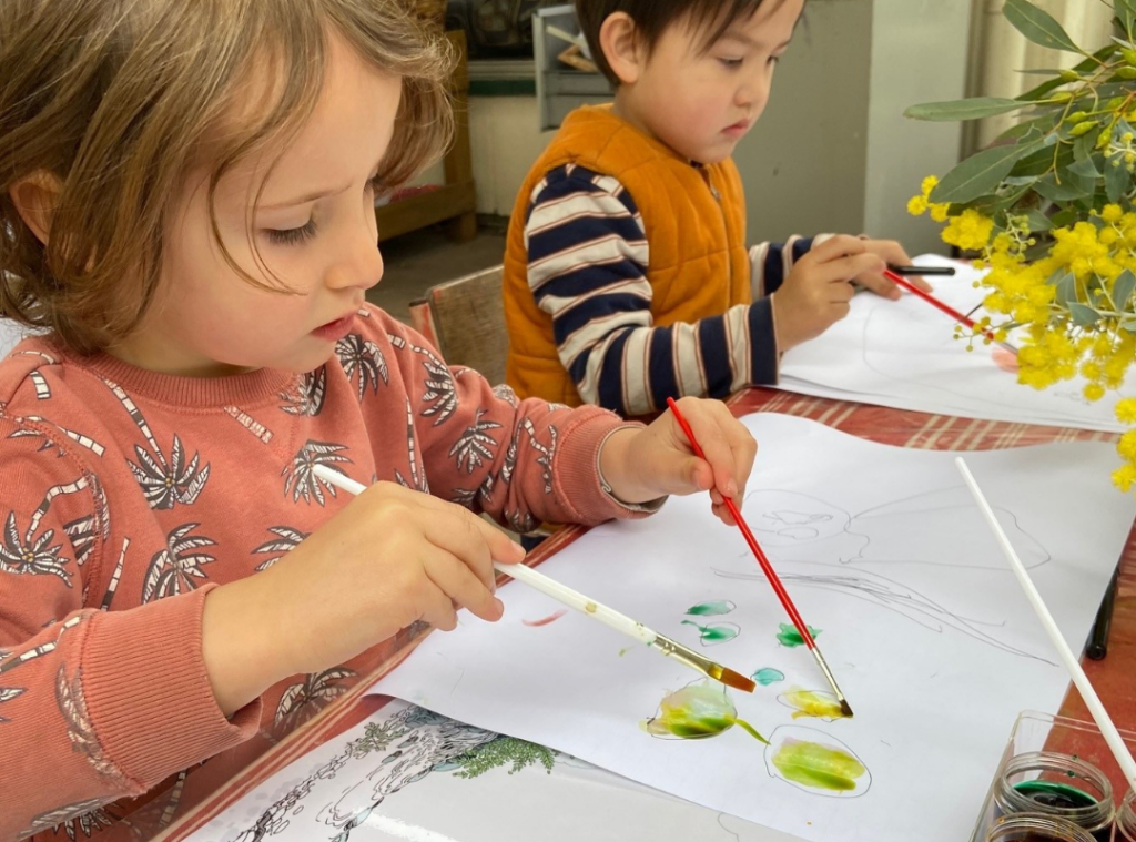 children drawing themes of nature at kindergarten